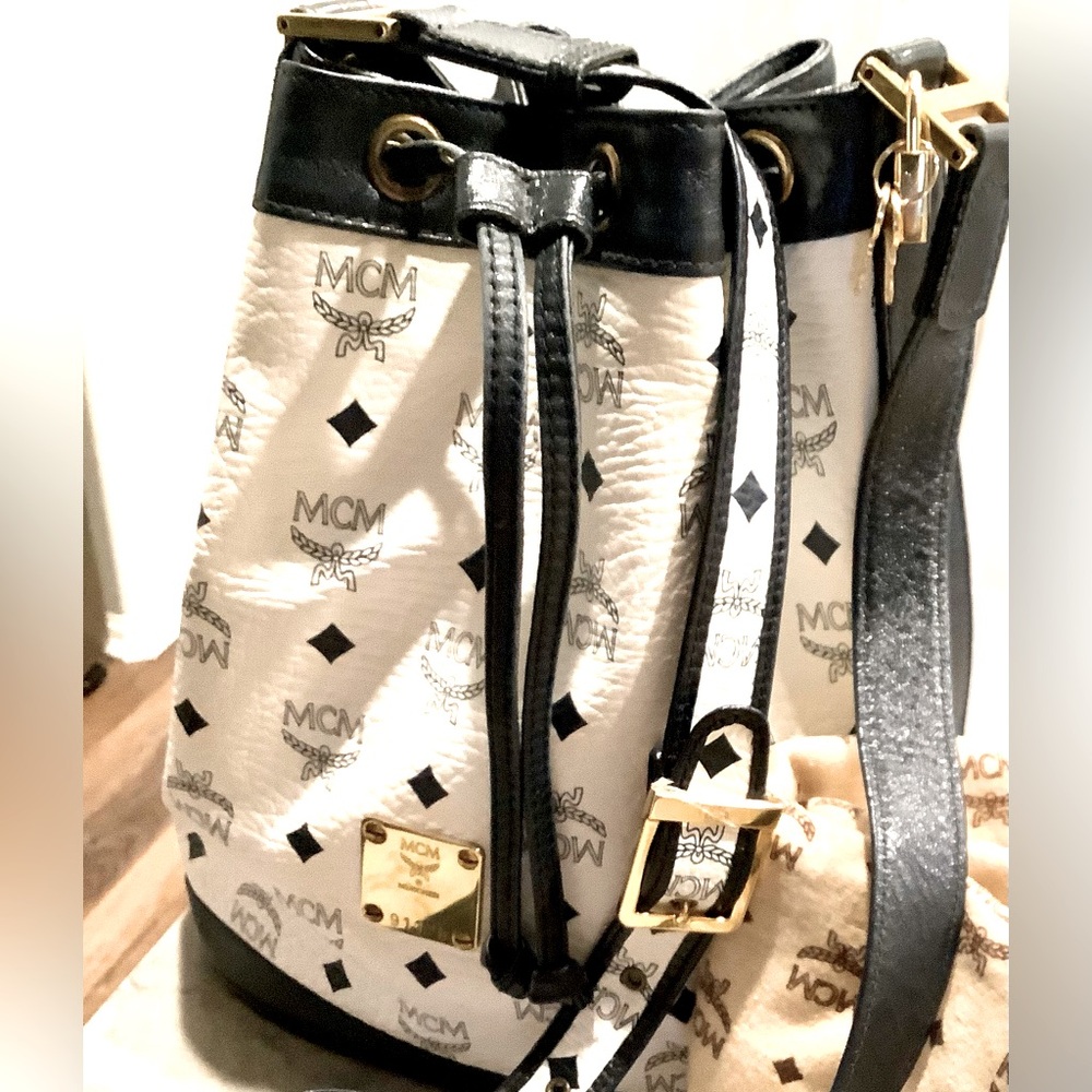 MCM VISETOS Monogram white bucket sling navyblue leather lining.Made in GERMANY